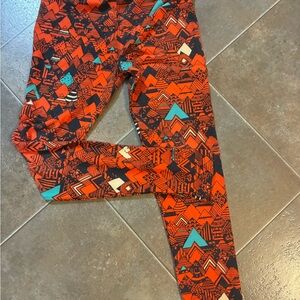 LuLaRoe Leggings in Orange and Teal Geometric Print Tween